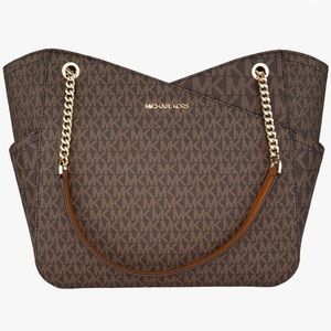 Michael Kors Sienna Satchel made with rich pebble leather.  Gold tone hardware
